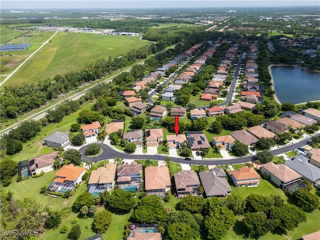 12391 Muddy Creek Ln, Fort Myers, FL 33913 - view of property location featuring a large body of water and nearby suburban area