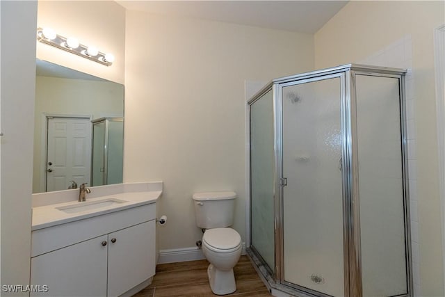 12391 Muddy Creek Ln, Fort Myers, FL 33913 - full bathroom featuring a stall shower, vanity, and wood finished floors
