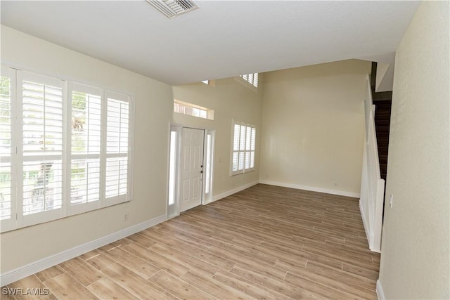 12391 Muddy Creek Ln, Fort Myers, FL 33913 - entryway featuring healthy amount of natural light and light wood finished floors