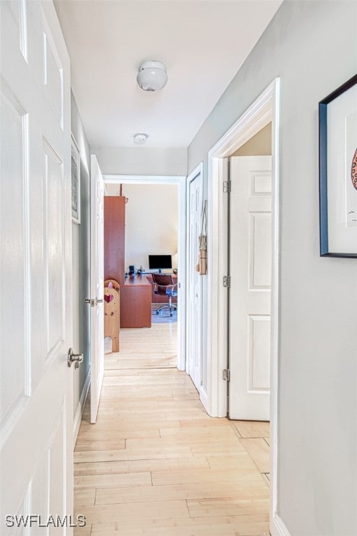 hall featuring light wood-style flooring