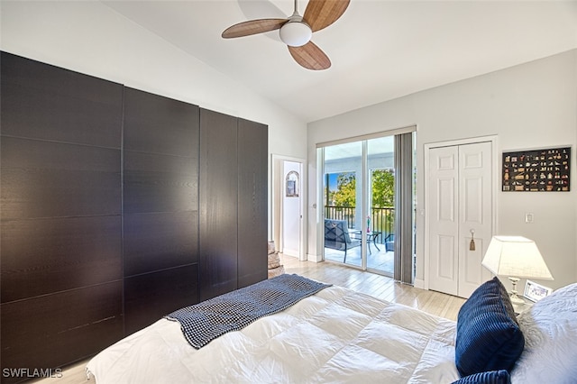 bedroom with light wood-type flooring, access to exterior, a ceiling fan, and vaulted ceiling