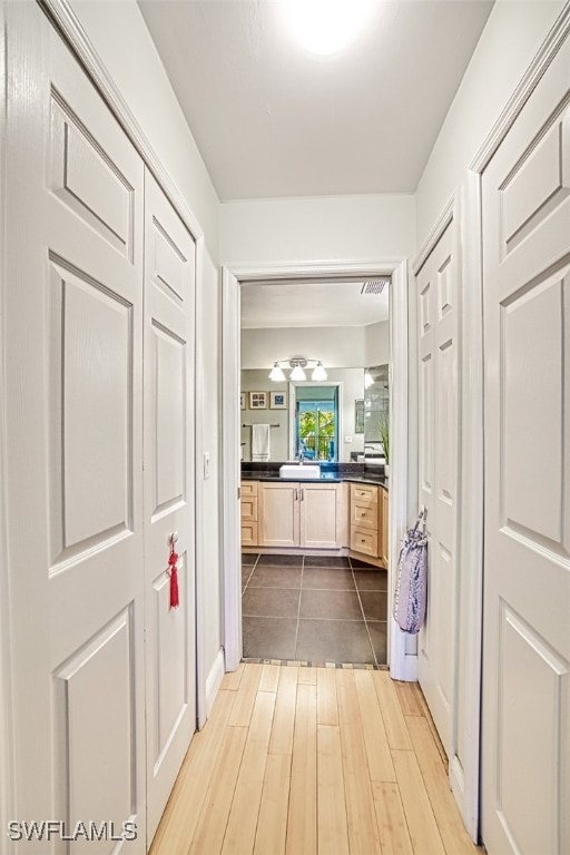 hallway featuring wood finished floors