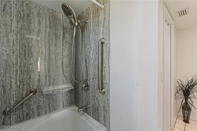 full bathroom with tile patterned floors, visible vents, and shower / tub combination