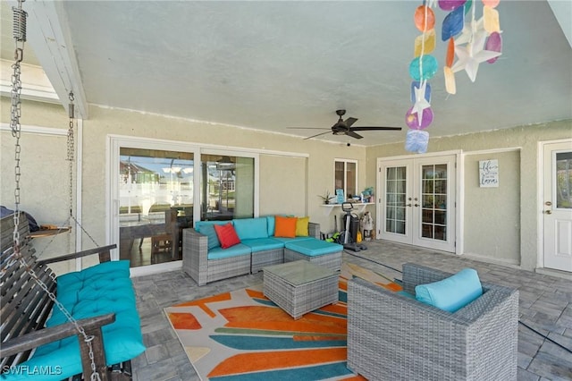 view of patio / terrace with outdoor lounge area, french doors, and a ceiling fan