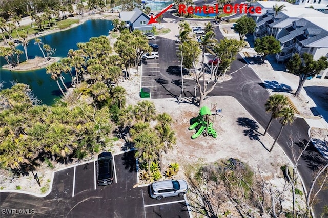 birds eye view of property featuring a water view