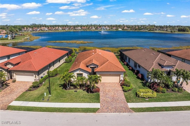 bird's eye view with a water view