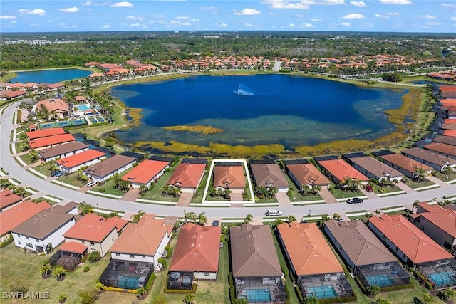 aerial view featuring a residential view and a water view