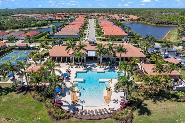 aerial view with a water view and a residential view