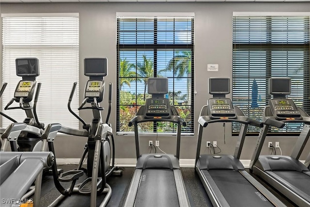 exercise room with baseboards