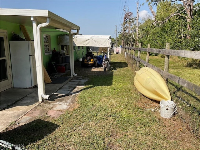 view of yard with fence