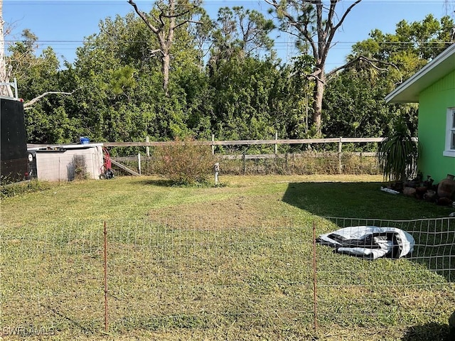 view of yard with fence