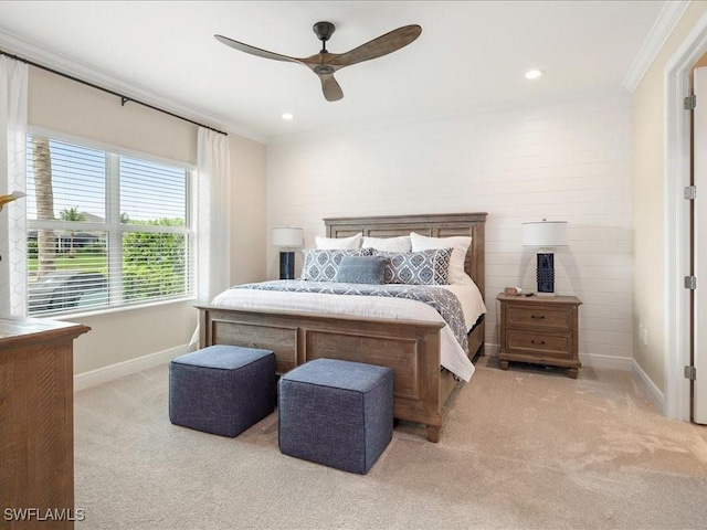 bedroom featuring light carpet, recessed lighting, crown molding, baseboards, and ceiling fan