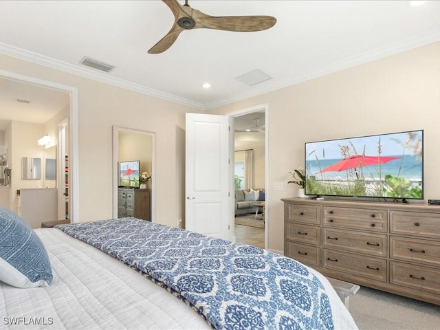 bedroom with visible vents, light colored carpet, crown molding, and ceiling fan