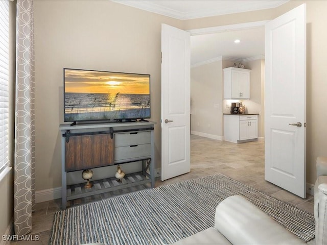 bathroom with baseboards and ornamental molding