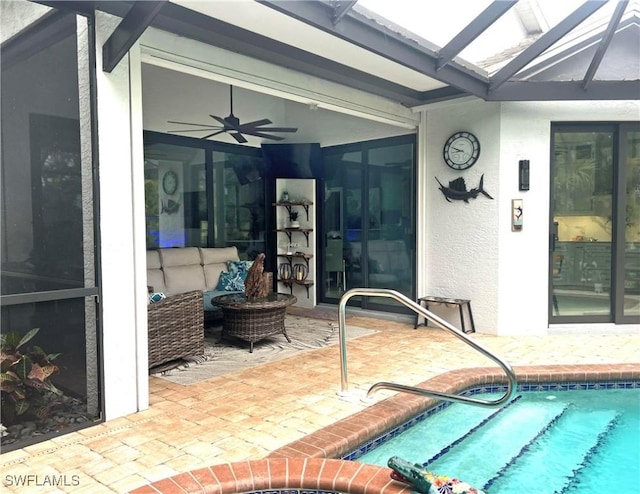 exterior space featuring a lanai, a ceiling fan, and a patio area