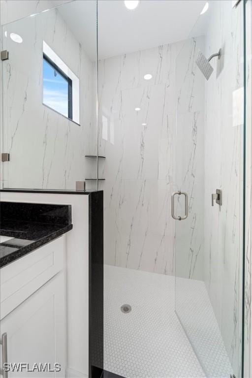 5306 Lee St, Lehigh Acres, FL 33971 - bathroom with a marble finish shower and vanity