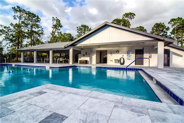 pool with a patio area