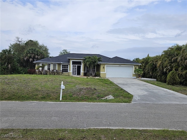 ranch-style home with concrete driveway, a garage, a front yard, and stucco siding