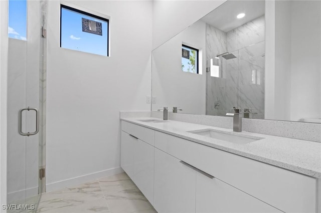 bathroom featuring a sink, a marble finish shower, and marble finish floor