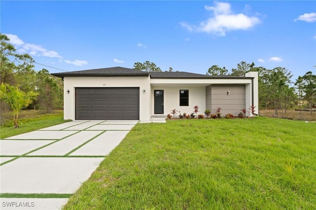 view of front of home with stucco siding, a front lawn, concrete driveway, and an attached garage