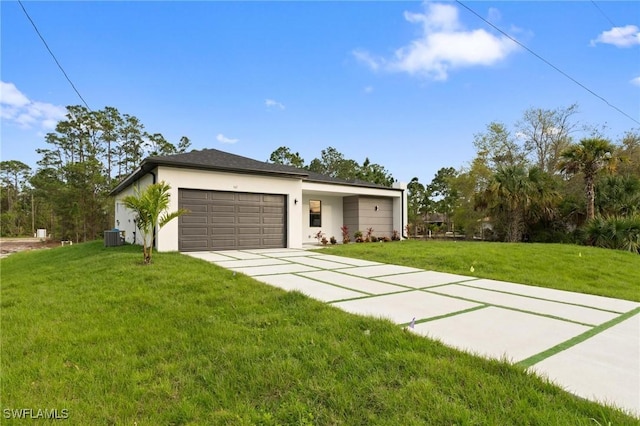 view of front of house featuring stucco siding, a front lawn, concrete driveway, a garage, and central AC unit