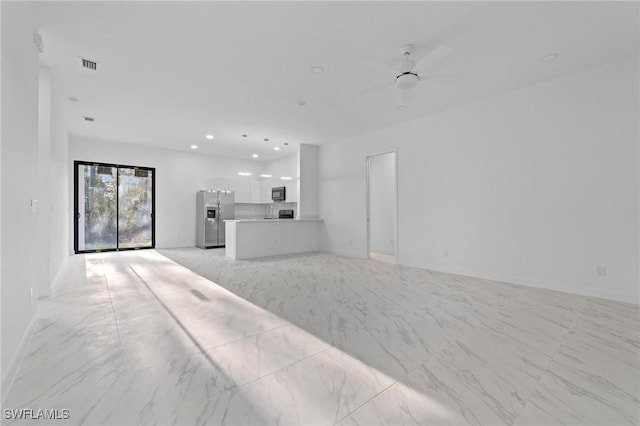 unfurnished living room featuring recessed lighting, visible vents, marble finish floor, and a ceiling fan