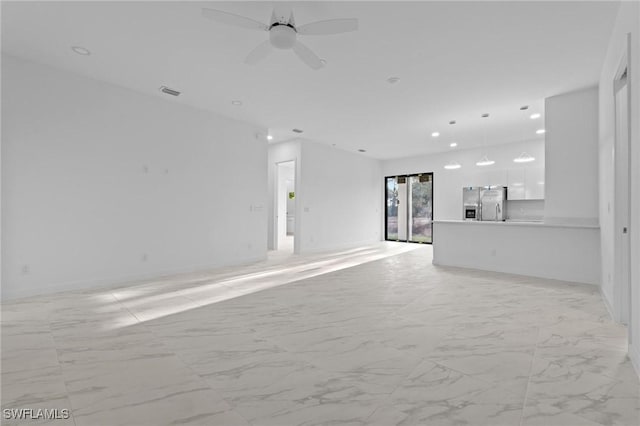 unfurnished living room featuring visible vents, baseboards, recessed lighting, marble finish floor, and a ceiling fan