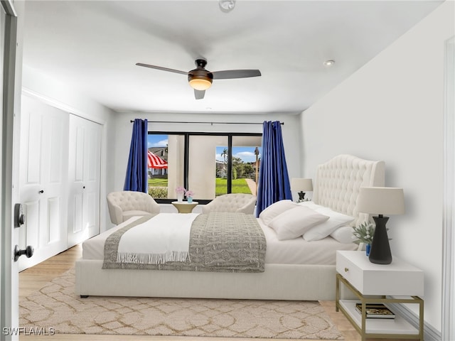 bedroom featuring a closet, a ceiling fan, and wood finished floors