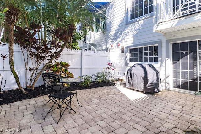 view of patio / terrace with fence and grilling area