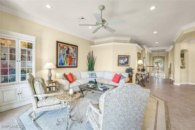 tiled living room with a ceiling fan, baseboards, visible vents, recessed lighting, and ornamental molding