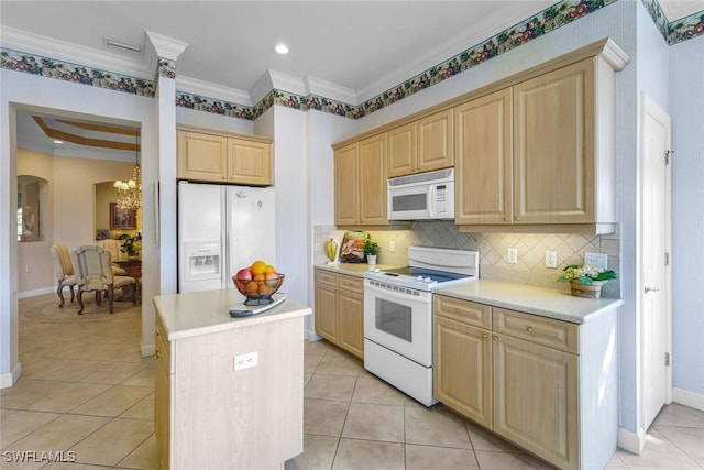 kitchen featuring white appliances, crown molding, light brown cabinets, and light countertops