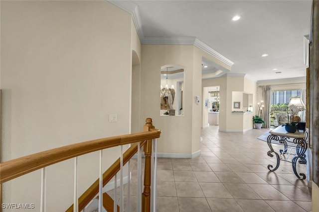 corridor featuring baseboards, ornamental molding, light tile patterned floors, an upstairs landing, and recessed lighting