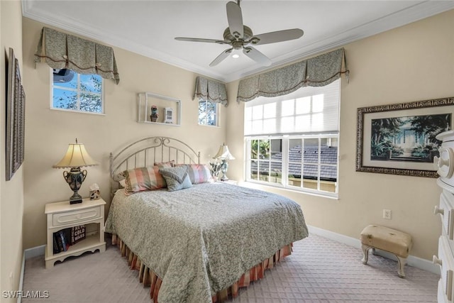 bedroom featuring ceiling fan, baseboards, carpet, and ornamental molding