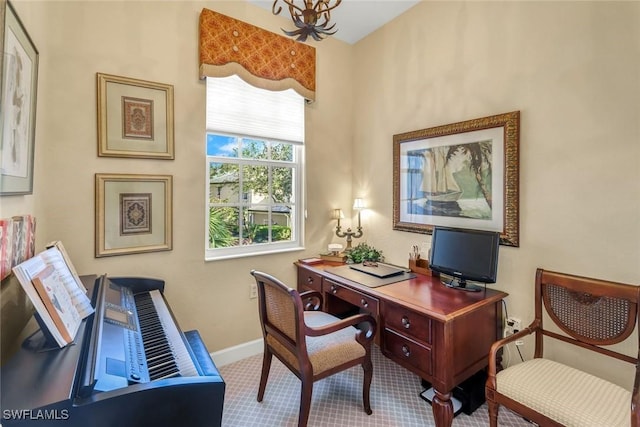 office space featuring baseboards and carpet flooring