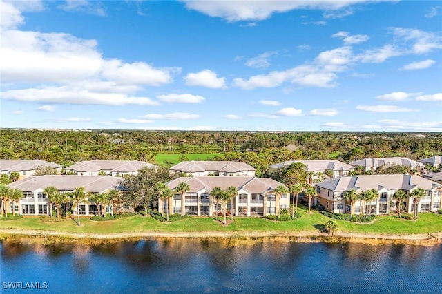 bird's eye view with a residential view and a water view