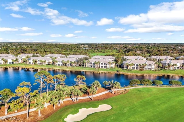 birds eye view of property featuring a residential view and a water view