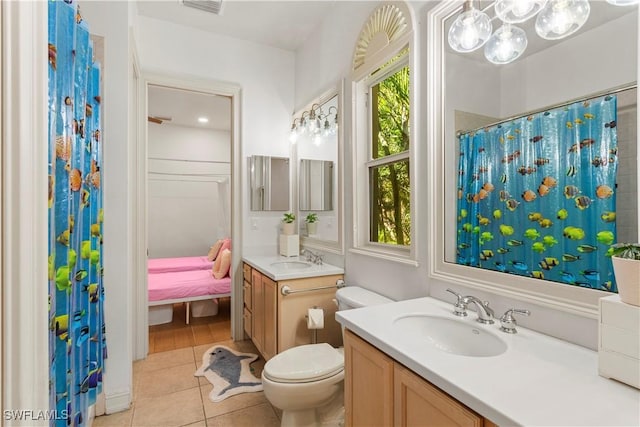 full bath with tile patterned floors, toilet, curtained shower, connected bathroom, and vanity