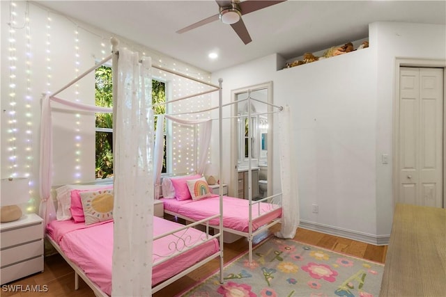 bedroom featuring recessed lighting, baseboards, and wood finished floors