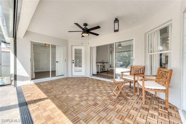 view of patio / terrace with a ceiling fan