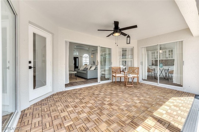 view of patio with ceiling fan