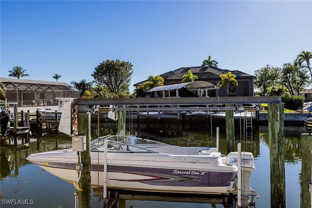 view of dock with a water view and boat lift