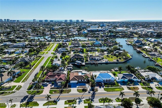 aerial view featuring a water view and a residential view