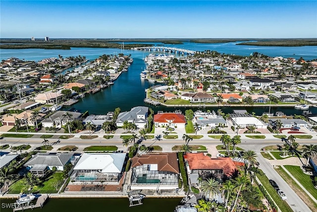 bird's eye view featuring a residential view and a water view