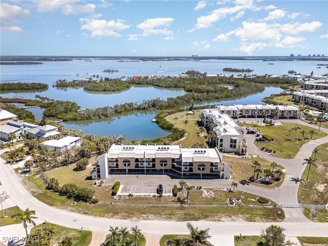 drone / aerial view with a water view