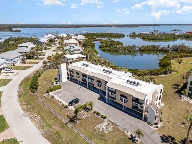 drone / aerial view with a water view