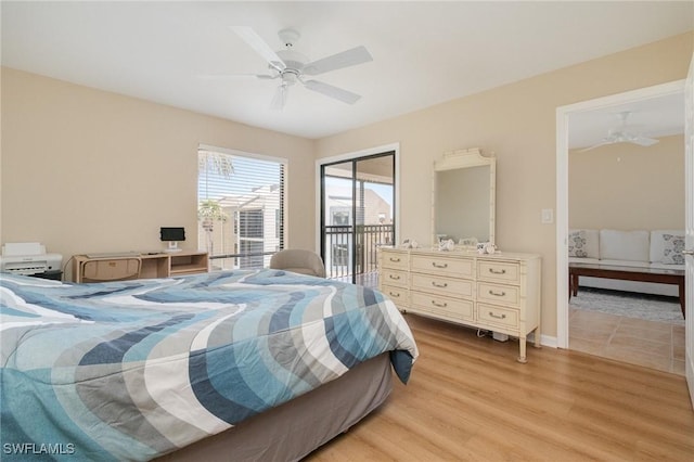 bedroom featuring a ceiling fan, light wood-style floors, and access to outside