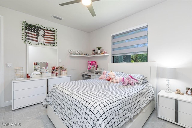 bedroom featuring visible vents and a ceiling fan