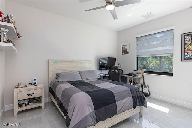 bedroom featuring visible vents, marble finish floor, baseboards, and ceiling fan