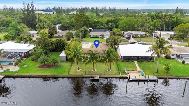 bird's eye view with a residential view and a water view