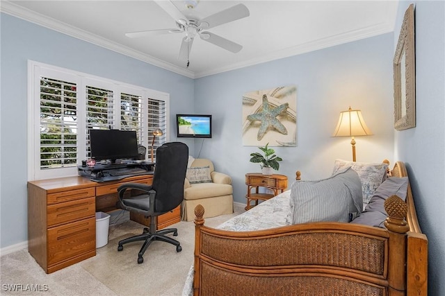 home office with baseboards, light carpet, ceiling fan, and crown molding